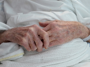 Elderly person in hospital.