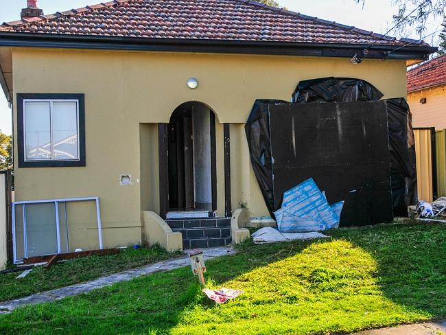 Officers were forced to partially remove the wall of a house because the 400kg resident c