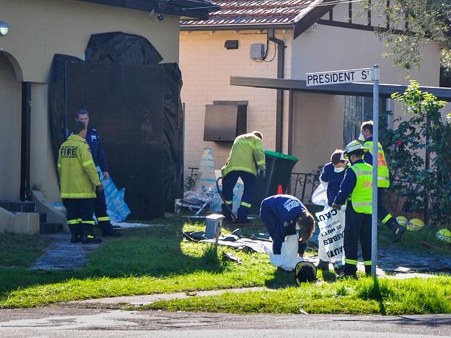 Fire and Rescue officers help NSW Ambulance crews remove a 400kg man from a house.