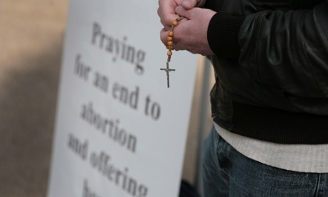 An anti-choice vigil outside an abortion clinic.