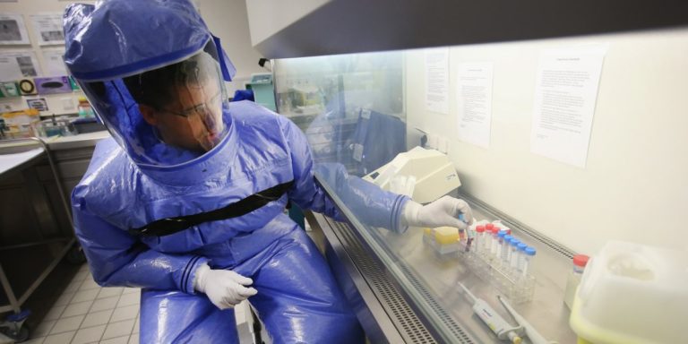 Inside An Outbreak: Incredible Photos Show Isolation Ward As It Prepares To Take On Ebola