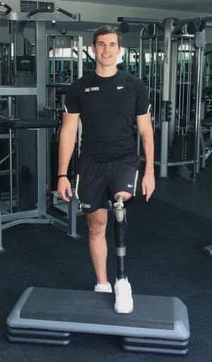 No mean feat: Patient Mitchell Grant exercises his prosthetic leg.