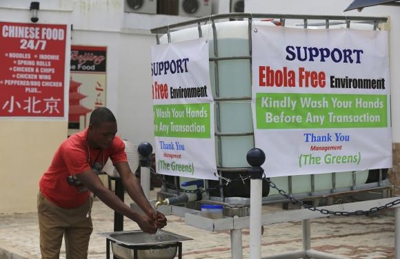 Liberian doctors strike, food prices spike as West Africa struggles to contain Ebola outbreak