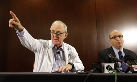 Dr. Edward Goodman, left, epidemiologist at Texas Health Presbyterian Hospital Dallas, at a news conference.