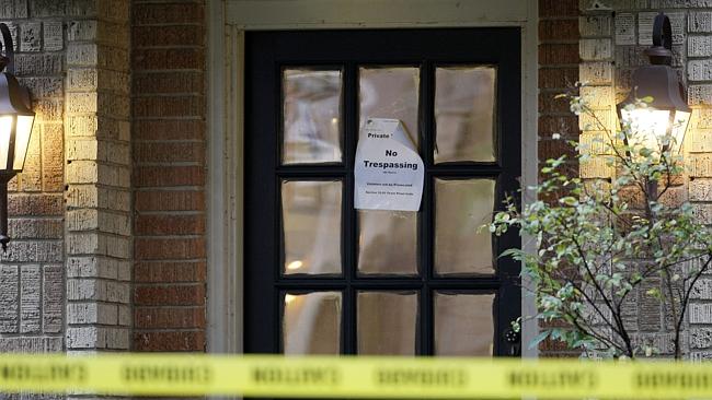 Fears ... a "no trespassing" notice is posted on the door of Nina Pham’s apartment.