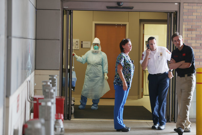 Health care workers at Texas Health Presbyterian Hospital, where the first case of Ebola contracted on U.S. soil was reported today.