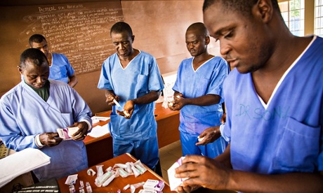 Healthcare workers prepare medicines at an Ebola treatment centre in Hastings, Sierra Leone.