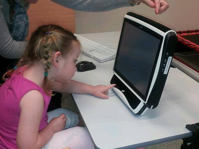 An “eye-gaze” machine helps her communicate without speech.