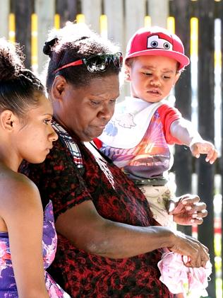 Families from across Manoora have paid their respects at the Murray St home.