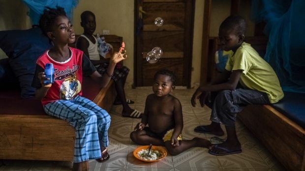 Ebola's children: Sweetie Sweetie (centre) with other children orphaned by Ebola at the group home.