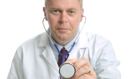 Doctor holding out his stethoscope