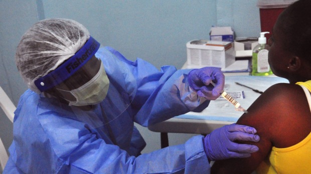 A woman takes part in an Ebola virus vaccine trial at the Redemption hospital in Monrovia, Liberia.