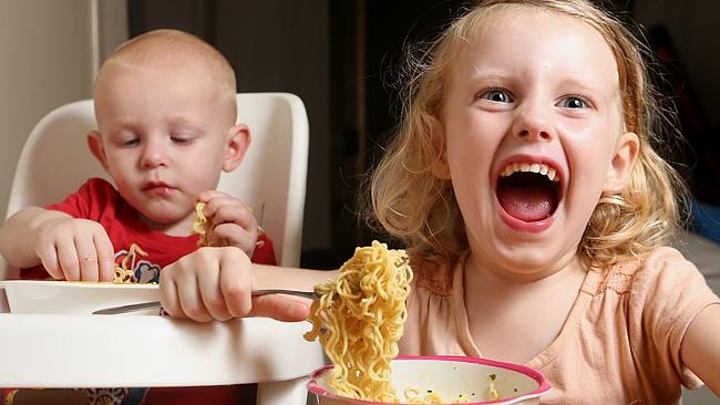 Charlie (15 months) and Heidi (3) Nugter enjoy eating the occasional two-minute noodle di