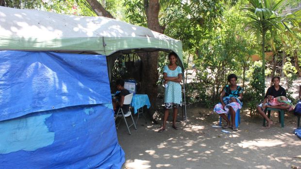 Mothers and their children outside the Marie Stopes PNG reproductive health outreach clinic during a visit to Joyce Bay settlement, Port Moresby.