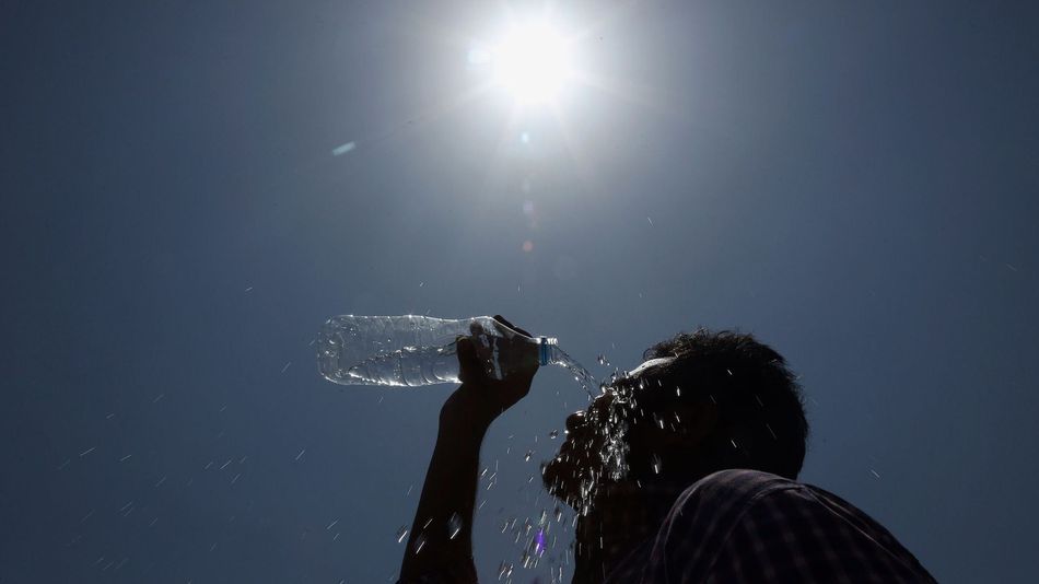 An Indian man cools off in the heat in Hyderabad, India on May 24, 2015.