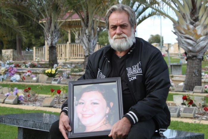 Geoff Diver with a picture of his daughter, Ruby Nicholls-Diver