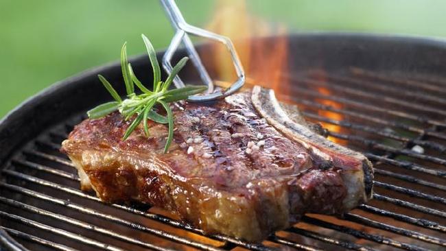 New research ... red meat has been linked to cancer but barbecuing it further increases the risk.